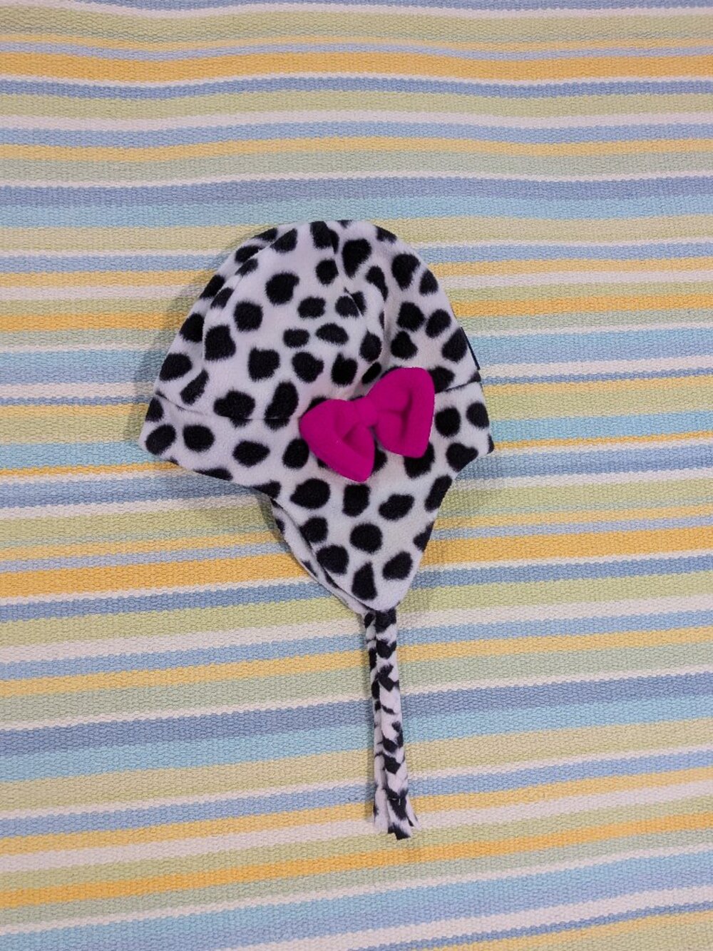 Girl's Lands End dalmatian / cow spotted fleece hat with magenta bow - Medium